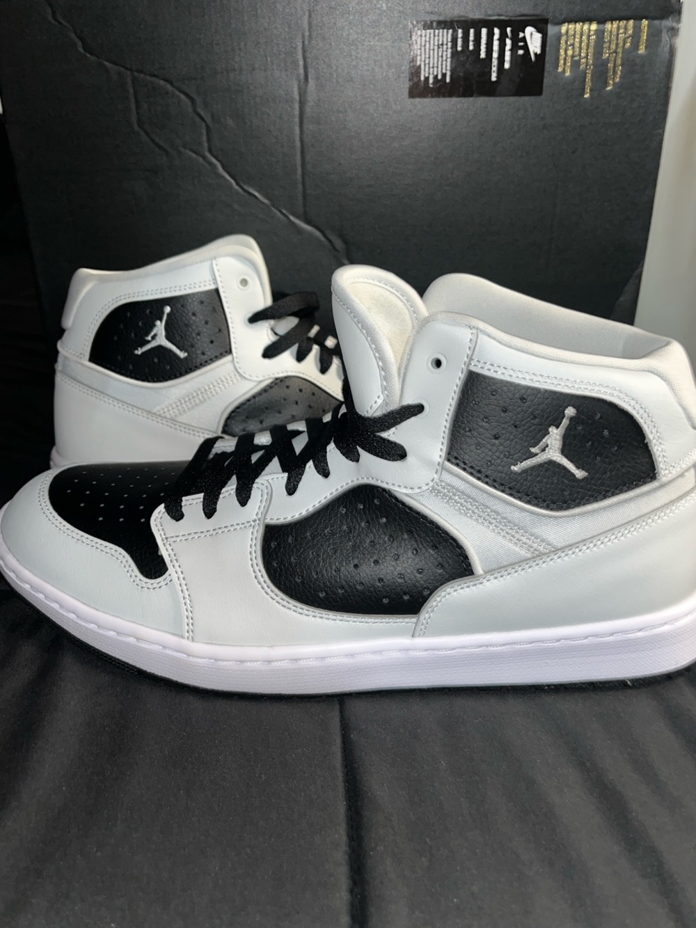 Nike Air Jordan Access Jumpman’s Mid-Top Sneakers in White and Black